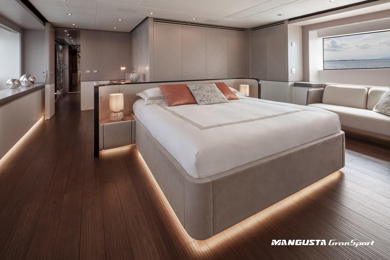 a large bed in a room aboard C2 Yacht for Charter