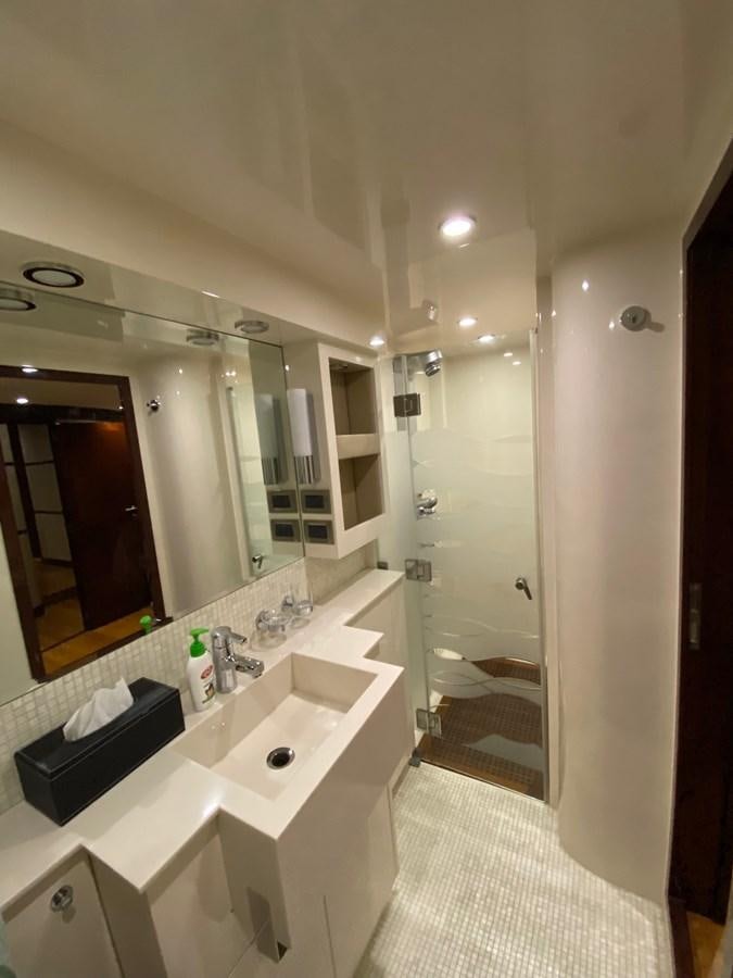 a bathroom with a large mirror aboard SERDAL Yacht for Sale