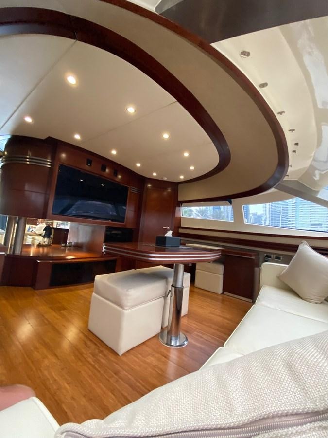 a room with a table and chairs aboard SERDAL Yacht for Sale