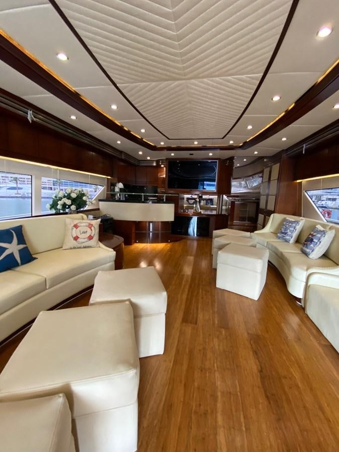 a living room with a large open window aboard SERDAL Yacht for Sale