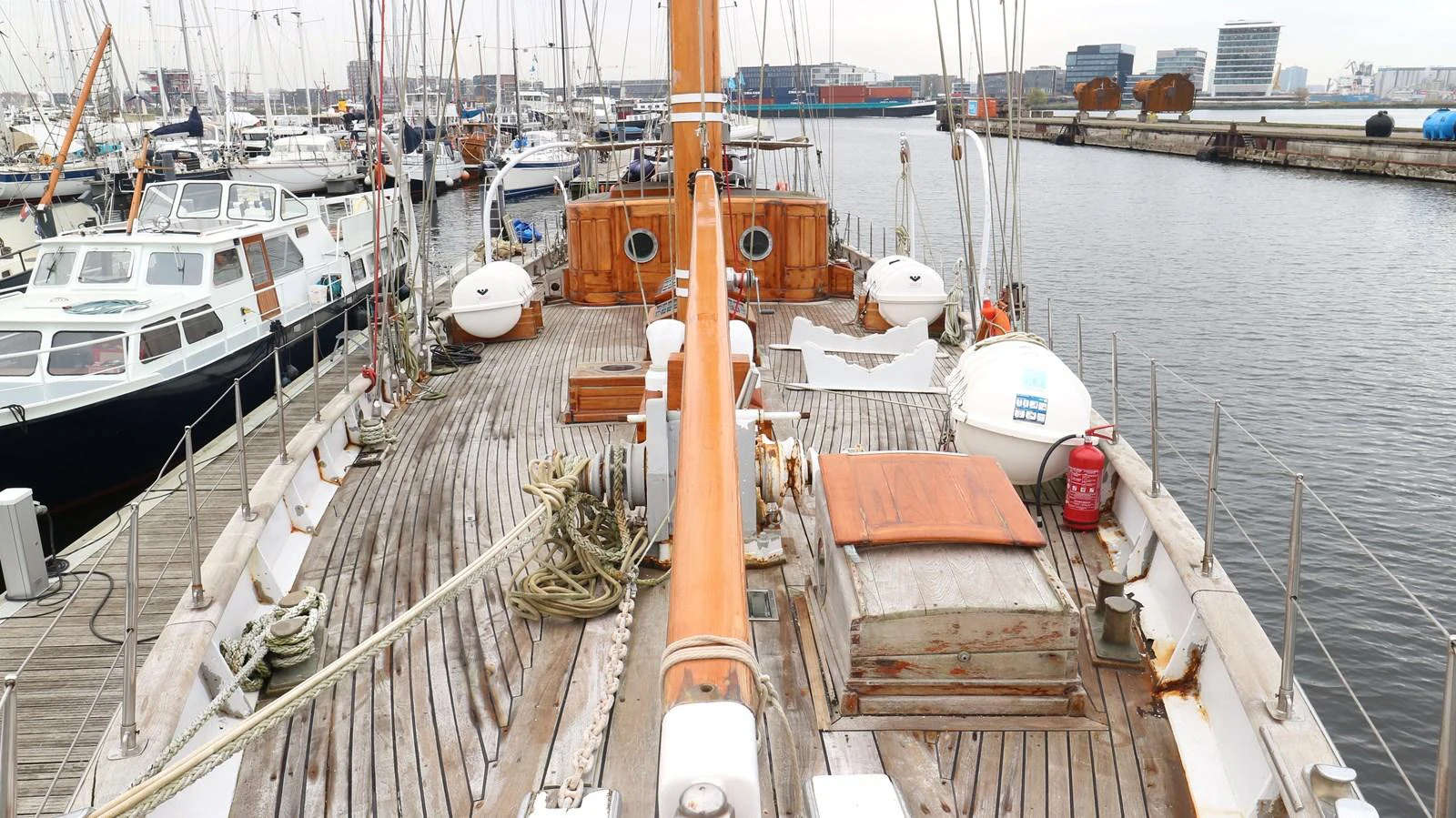 a boat docked at a pier aboard ARIES Yacht for Sale