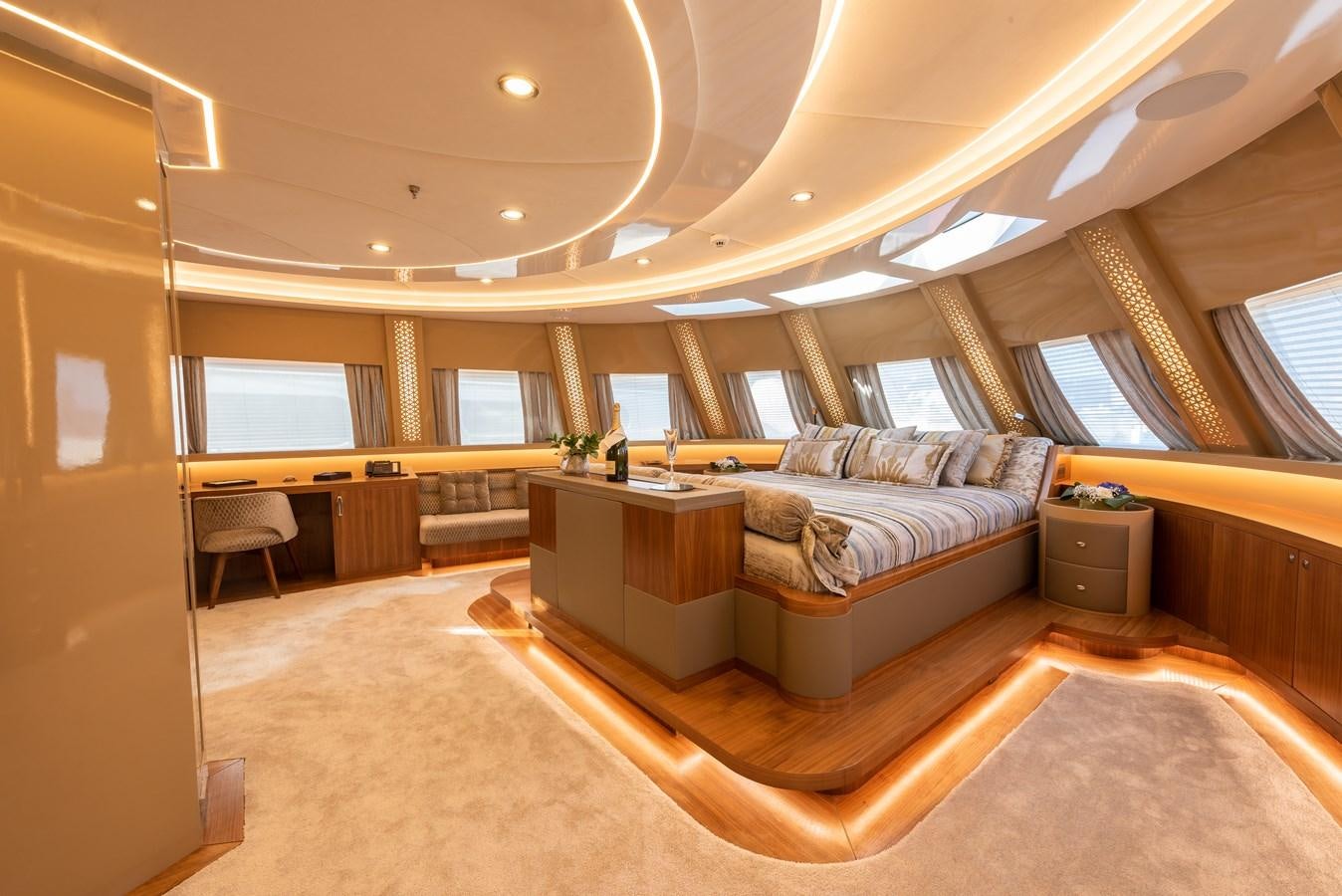 a large room with a couch and a table aboard ARESTEAS Yacht for Sale