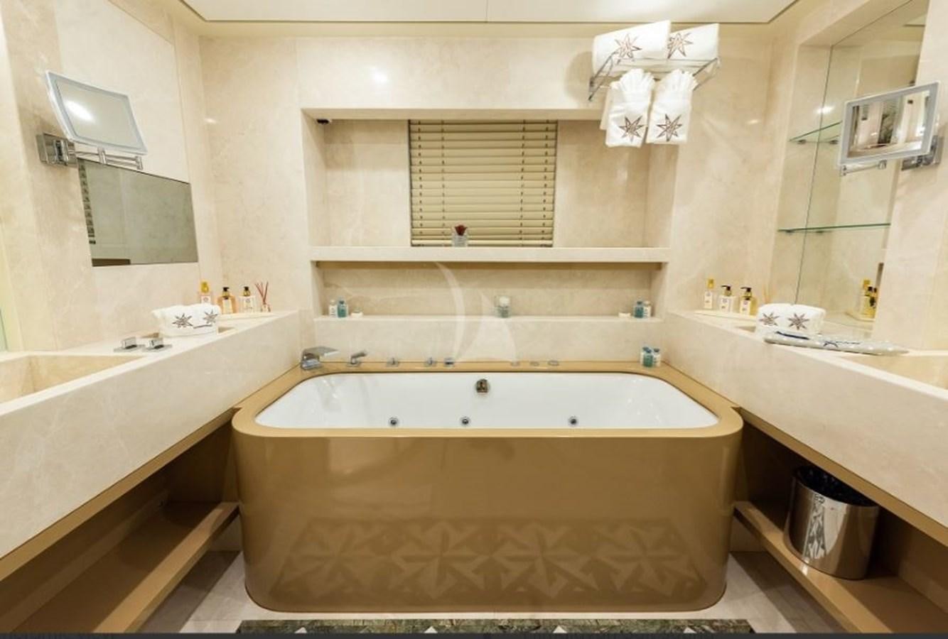 a bathroom with a tub aboard ARESTEAS Yacht for Sale