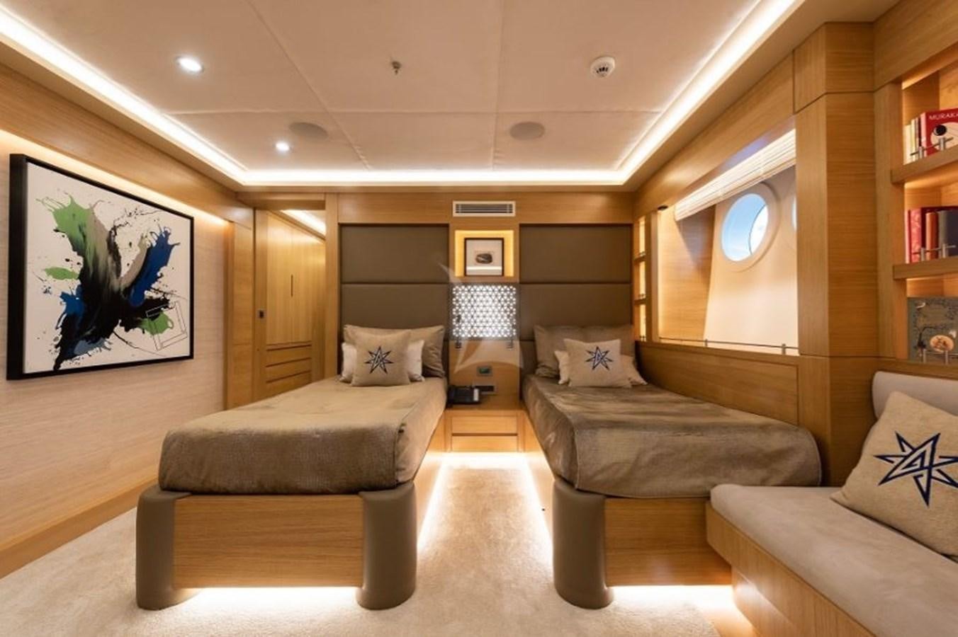 a room with couches and a table aboard ARESTEAS Yacht for Sale