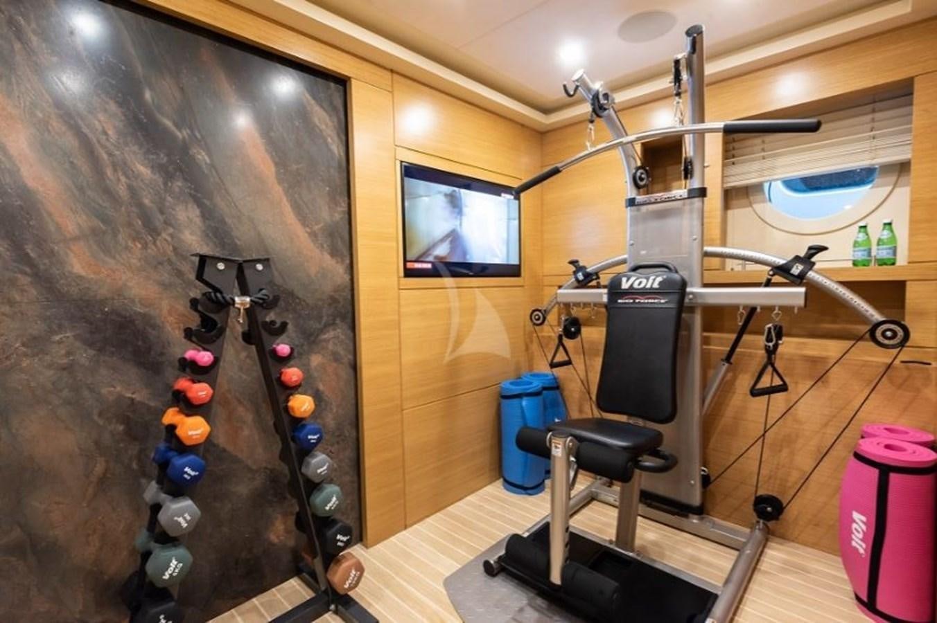 a room with a large wall with speakers and a tv on it aboard ARESTEAS Yacht for Sale