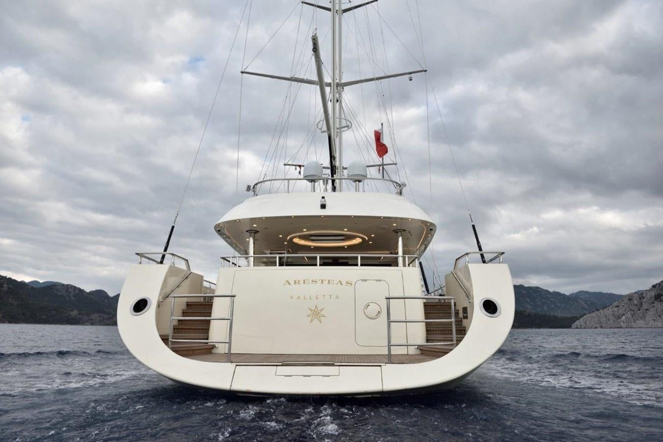a white boat in the water aboard ARESTEAS Yacht for Sale