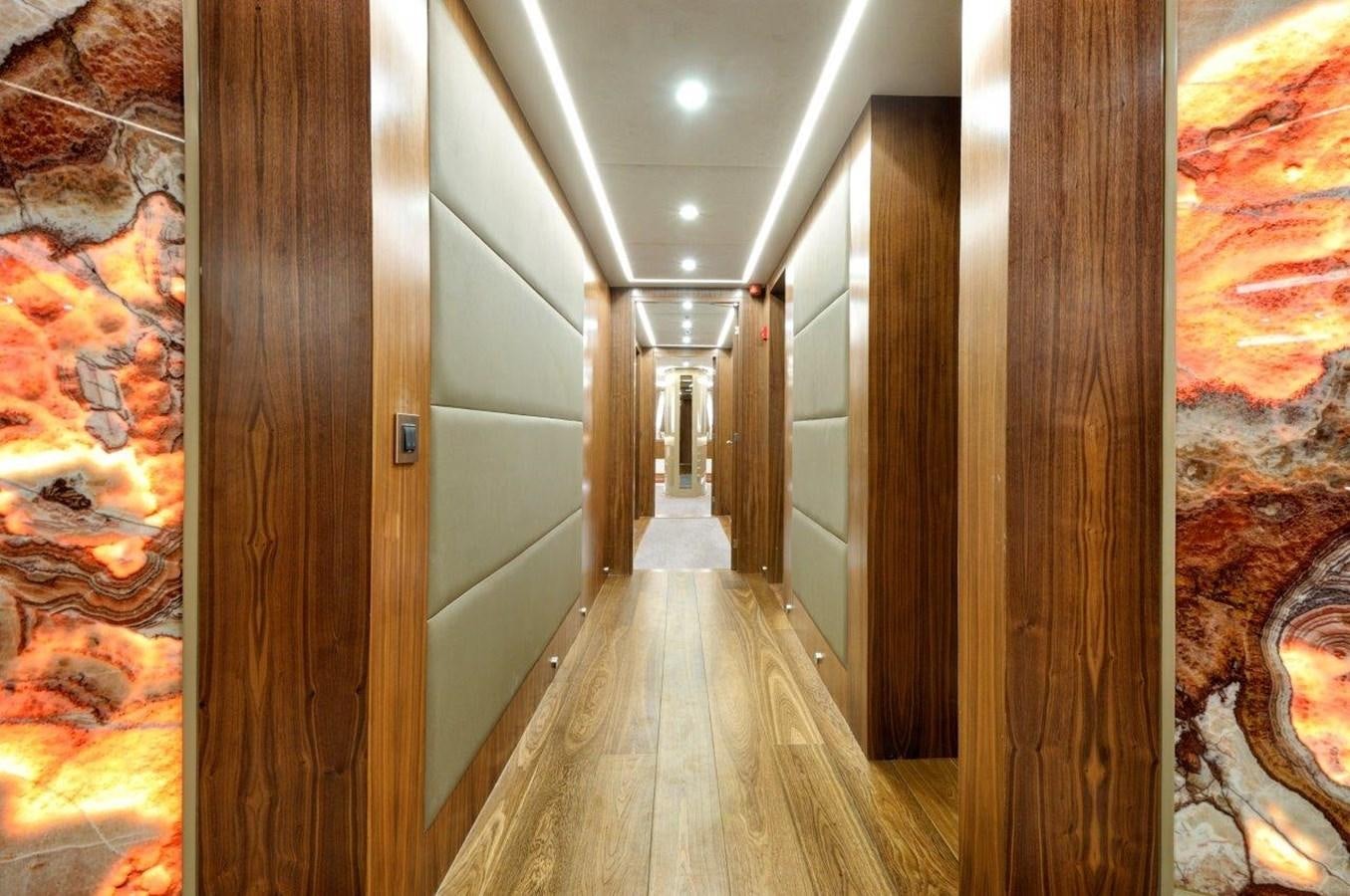 a hallway with wood doors aboard ARESTEAS Yacht for Sale