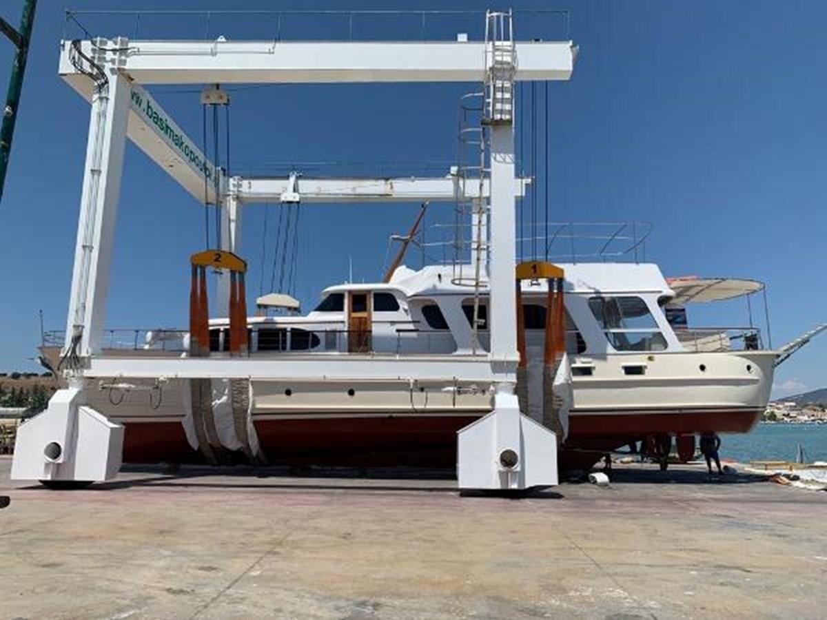 a boat on the water aboard 1960 CUSTOM CRUISER  Yacht for Sale