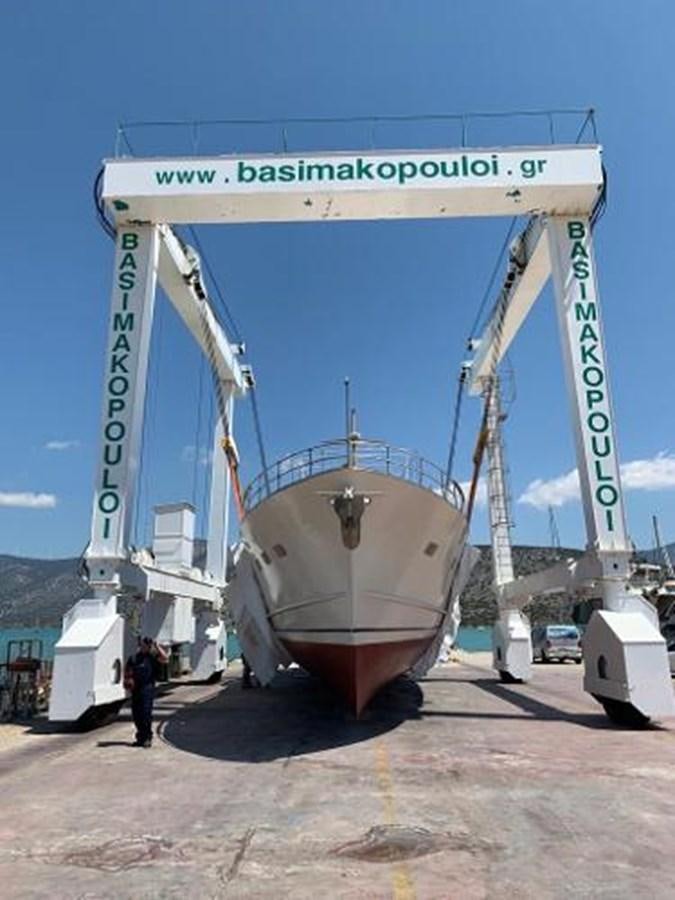 a large crane with a sign aboard 1960 CUSTOM CRUISER  Yacht for Sale