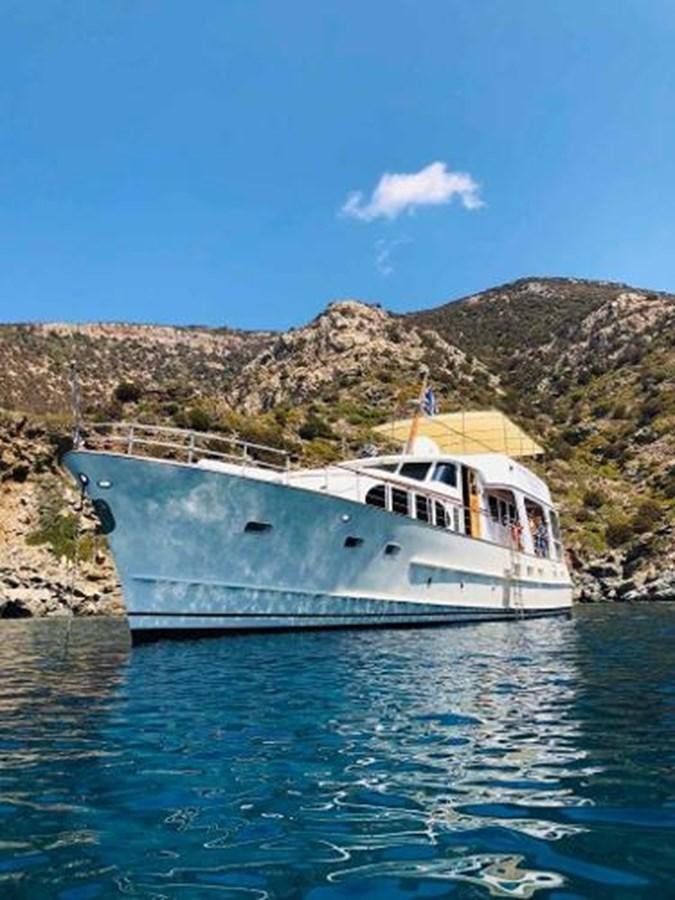 a boat on the water aboard 1960 CUSTOM CRUISER  Yacht for Sale