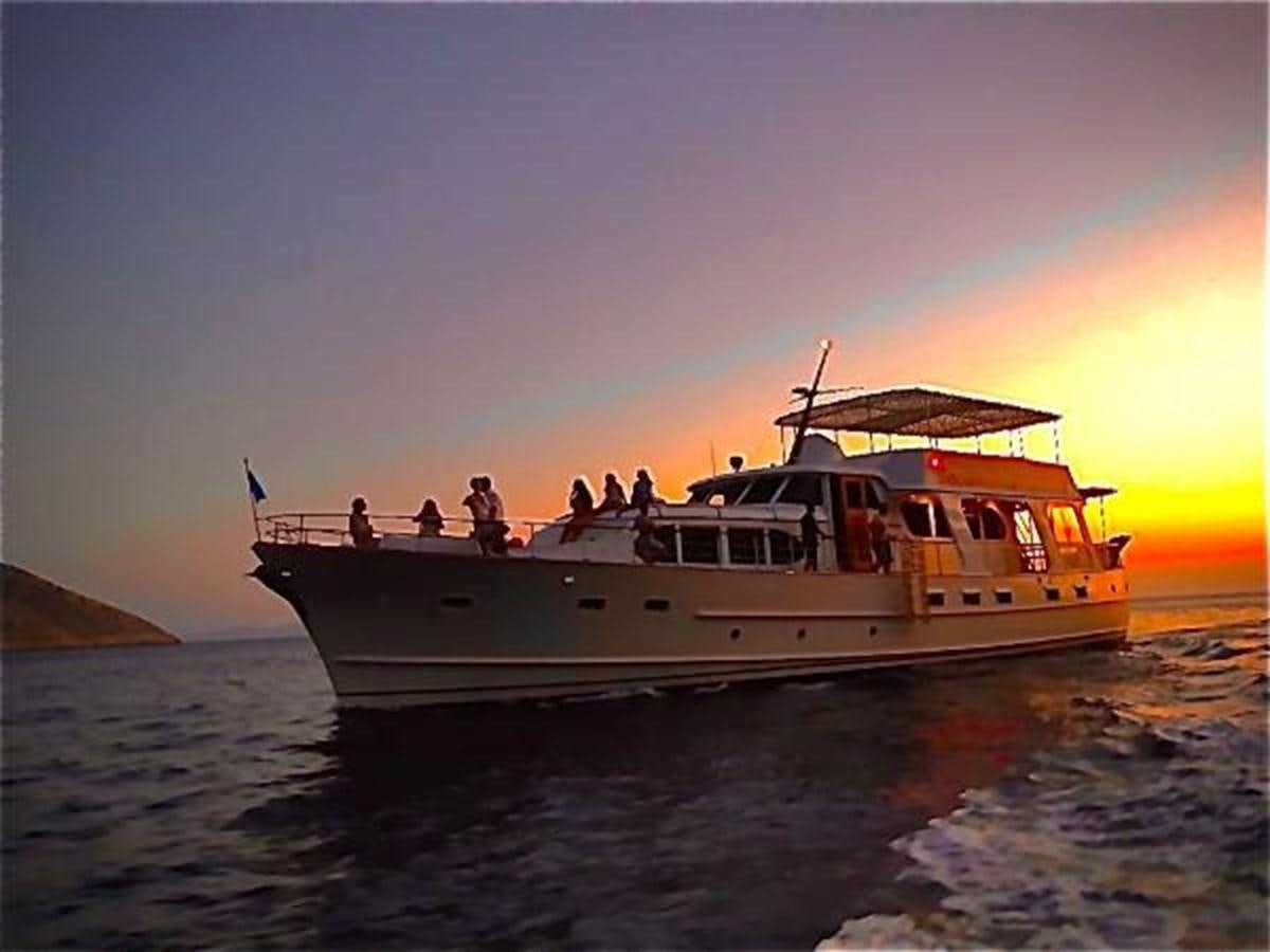 a boat with people on it aboard 1960 CUSTOM CRUISER  Yacht for Sale