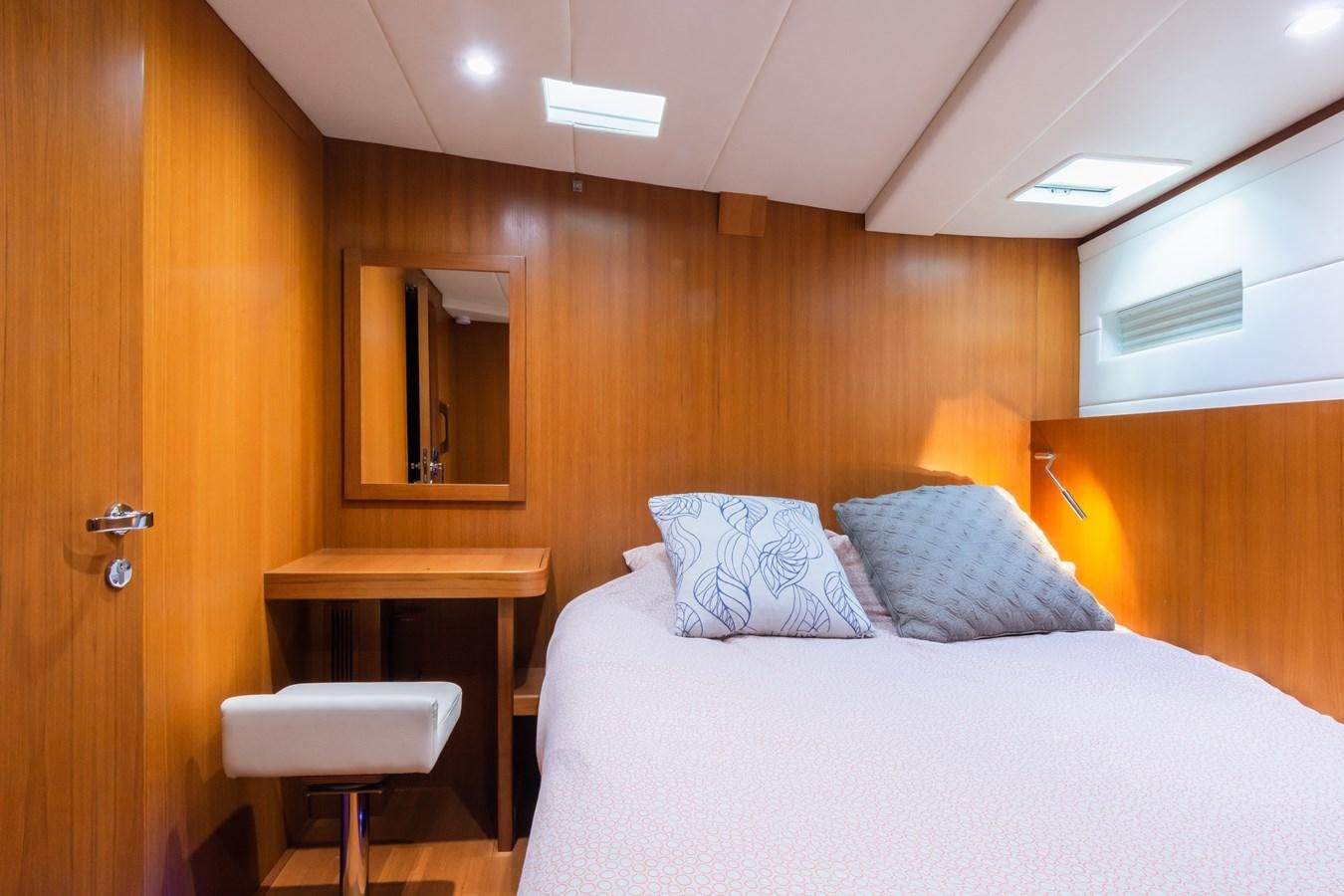 a bed in a room aboard SHADOW Yacht for Sale