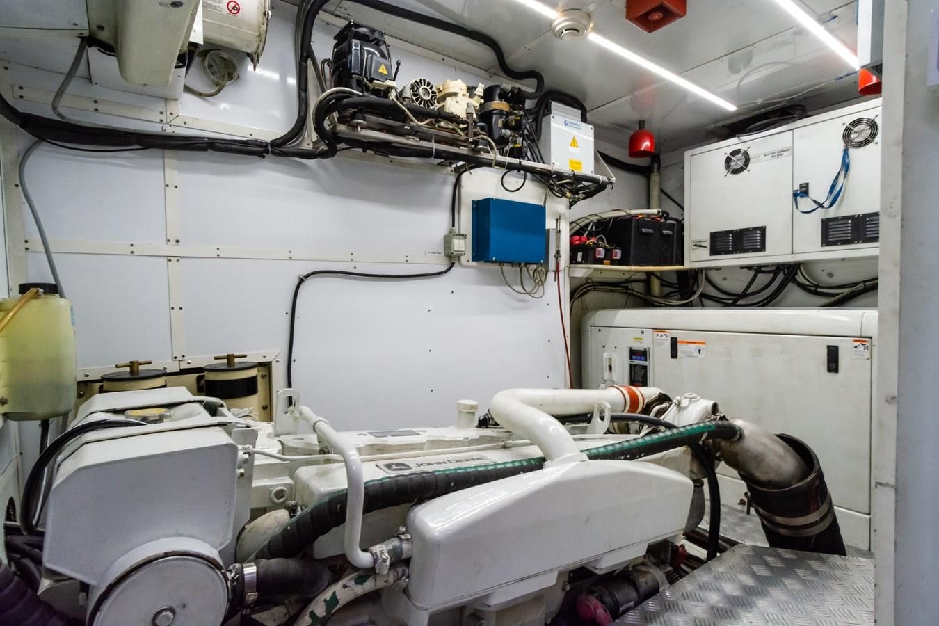 a machine with a large piece of equipment in it aboard SHADOW Yacht for Sale
