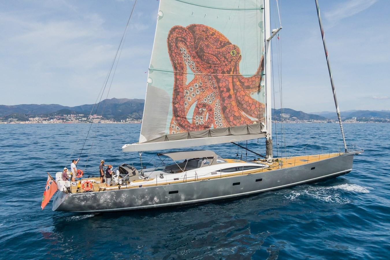 a sailboat with people on it aboard SHADOW Yacht for Sale