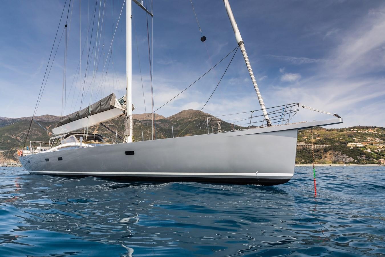 a white boat in the water aboard SHADOW Yacht for Sale