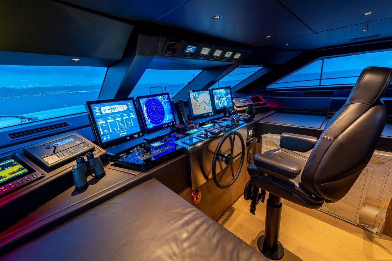 a control room with many monitors aboard AMWAJ Yacht for Sale