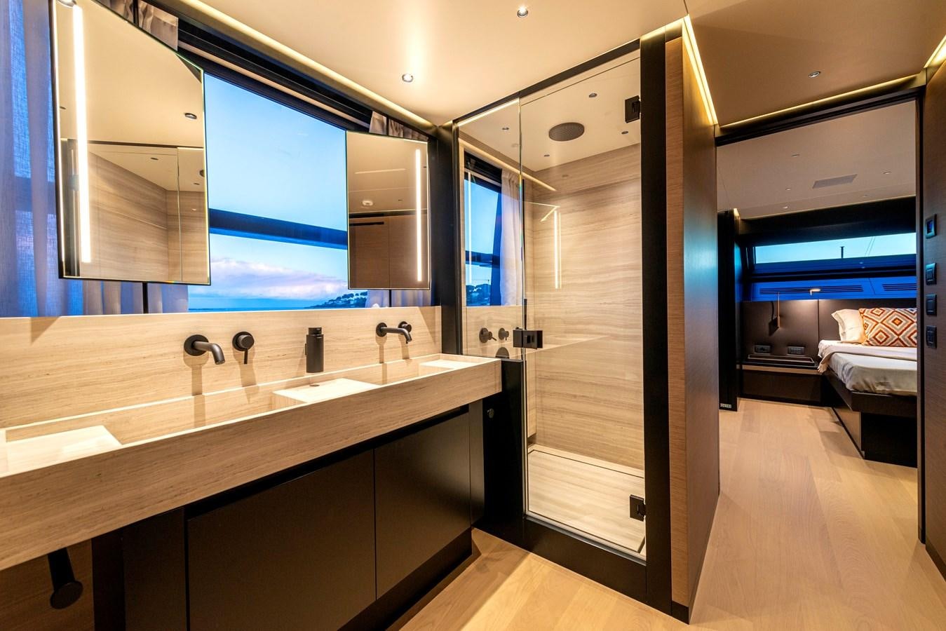 a bathroom with a large mirror aboard AMWAJ Yacht for Sale