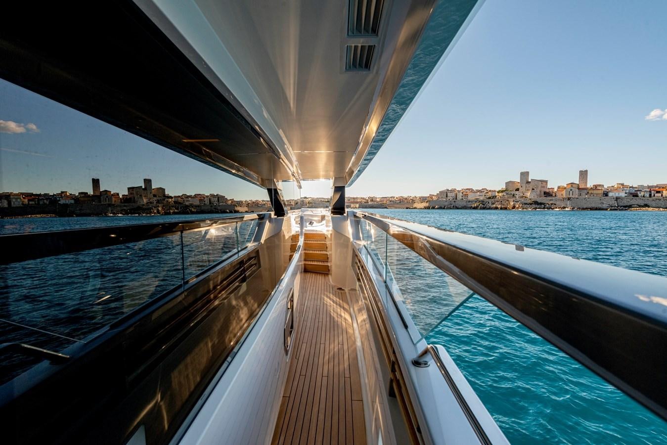 a deck of a boat on a body of water aboard AMWAJ Yacht for Sale