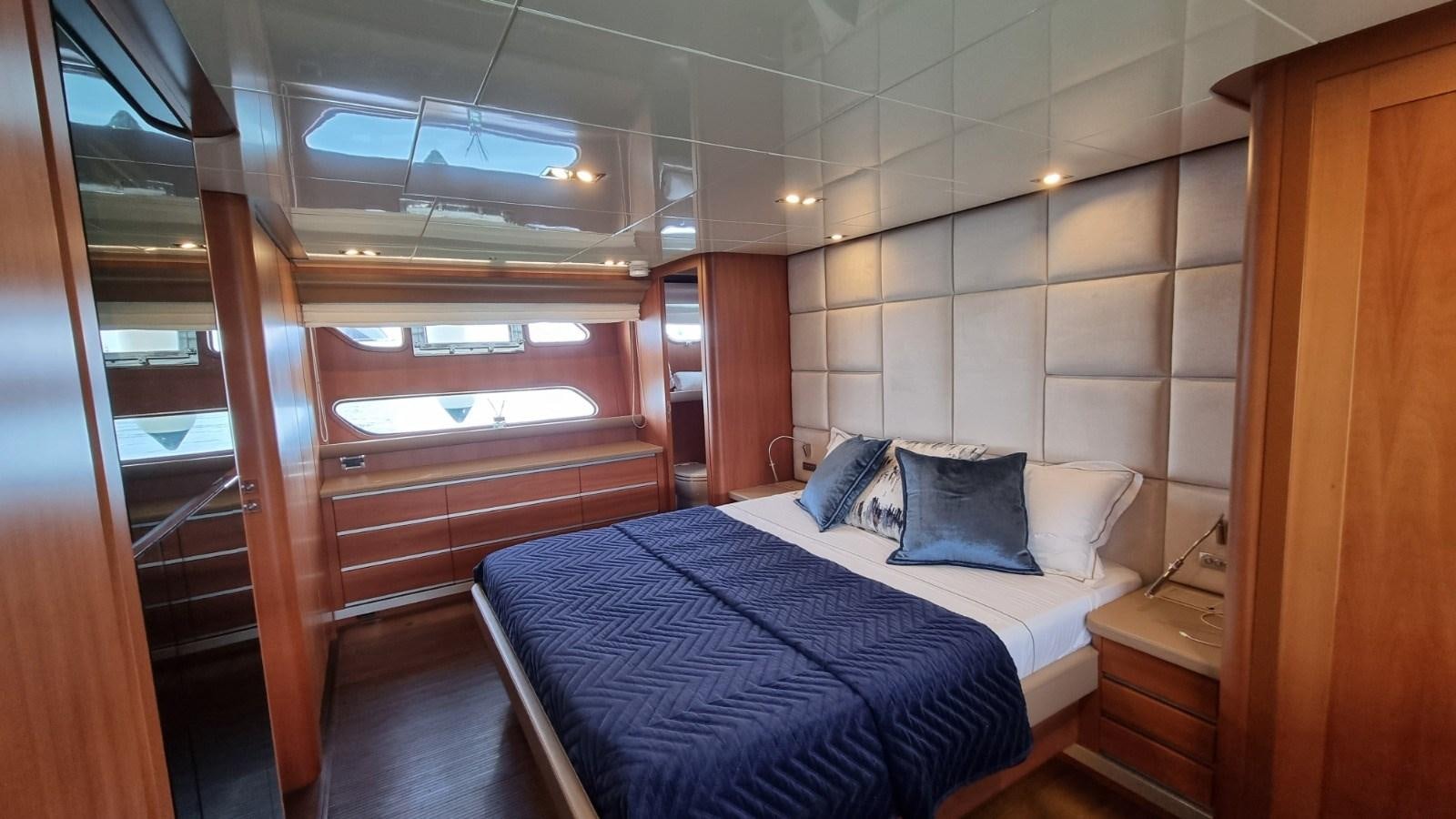 a bed in a room aboard FTS2 Yacht for Sale