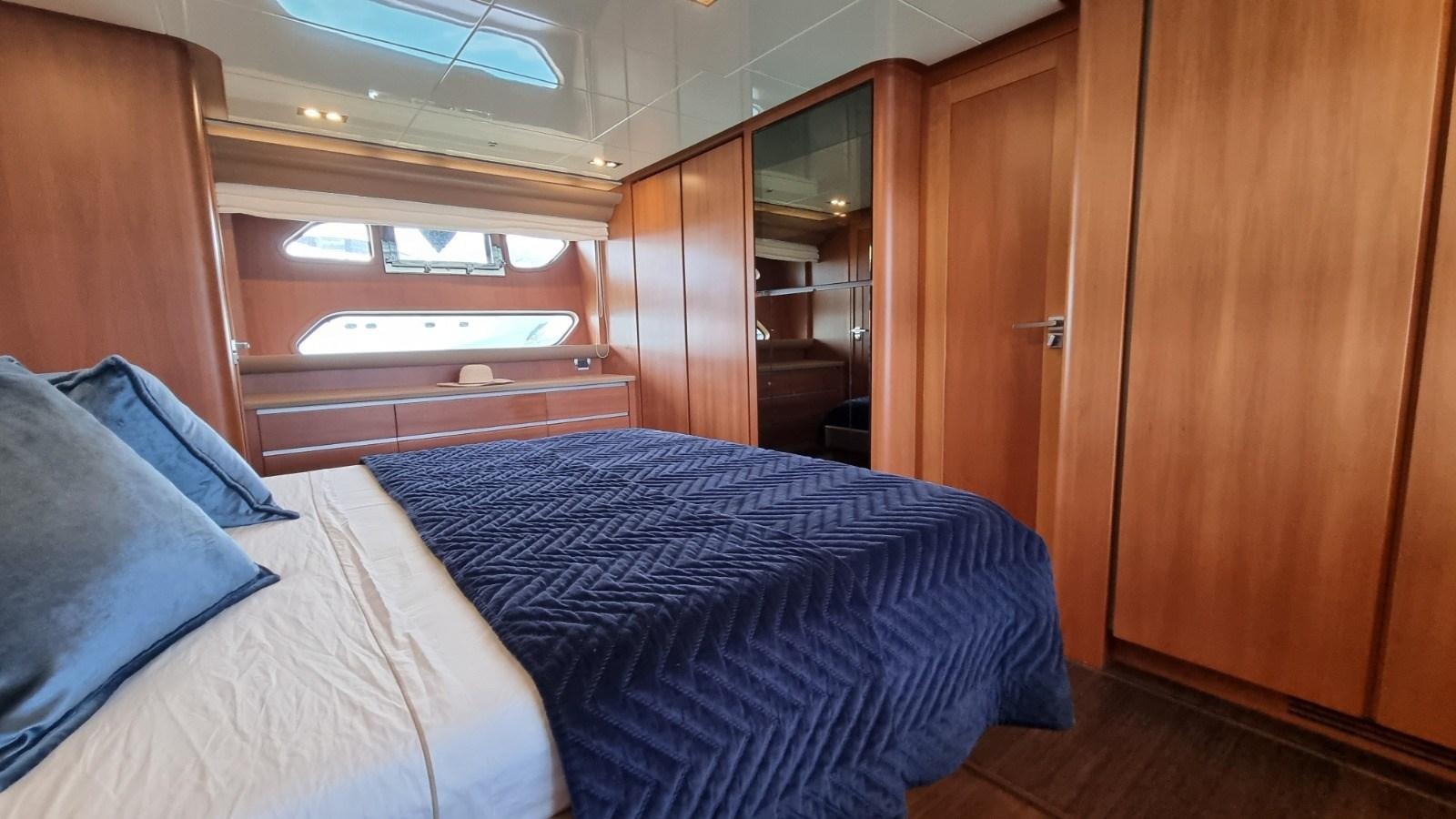 a bed in a room aboard FTS2 Yacht for Sale
