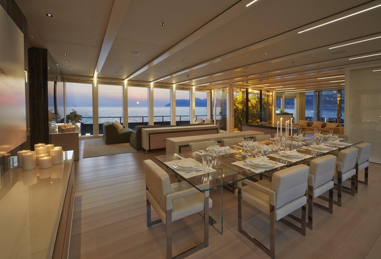 a large dining room with tables and chairs aboard STELLA MARIS Yacht for Sale