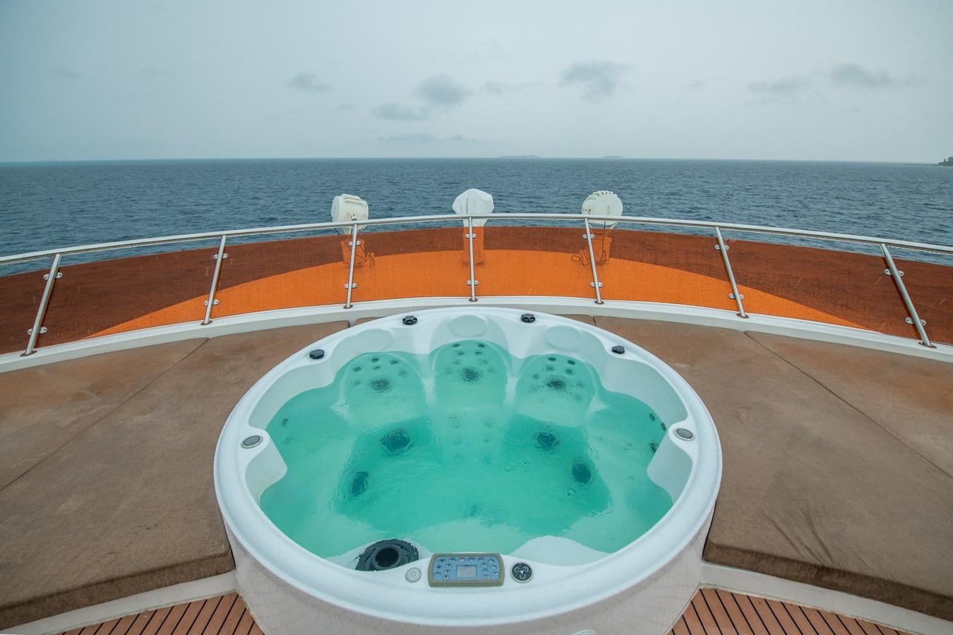 a speedboat on the water aboard INFINITY X Yacht for Sale