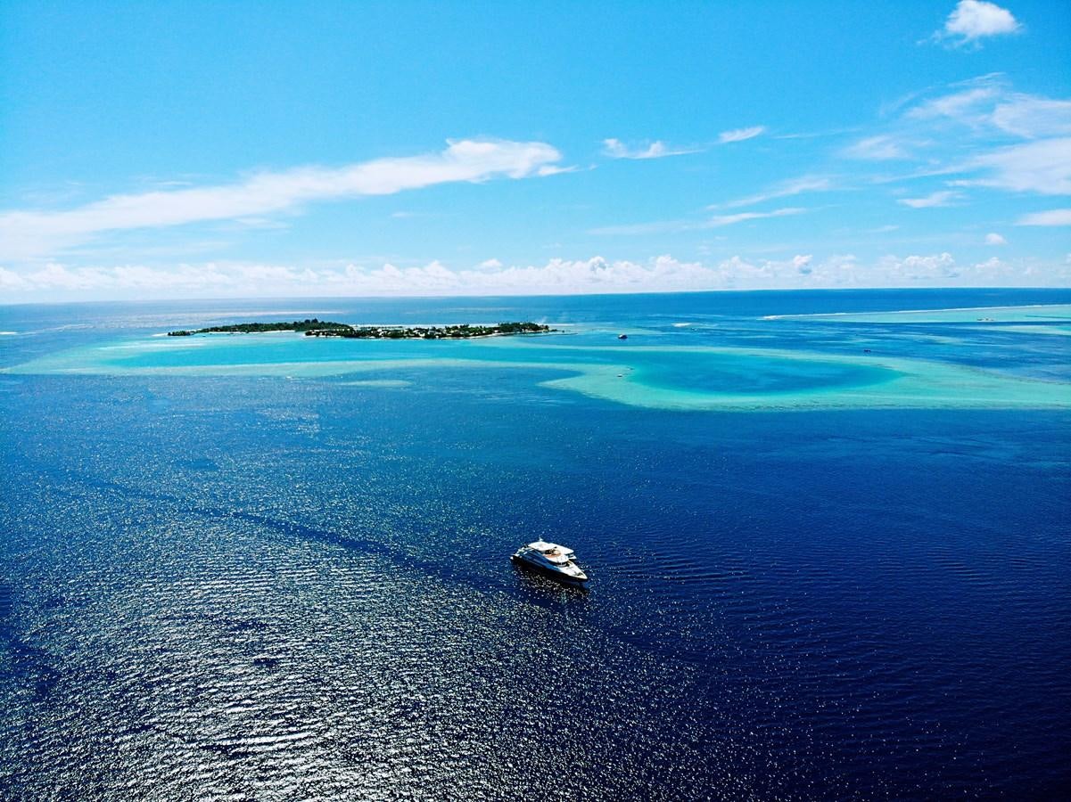 a boat in the water aboard INFINITY X Yacht for Sale