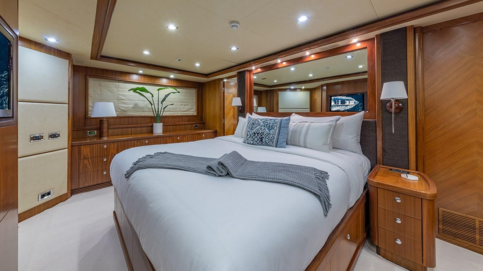 a bed in a room aboard KEFI Yacht for Sale