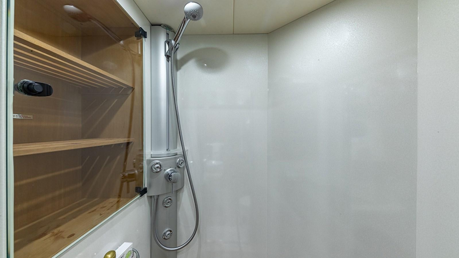 a shower with a glass door aboard KEFI Yacht for Sale