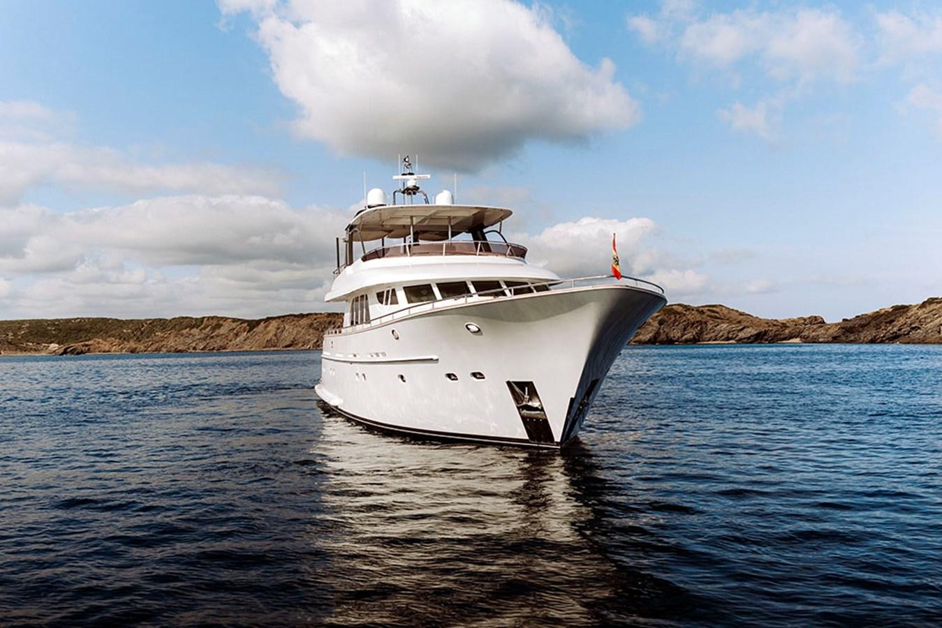 a white boat in the water aboard LAS NINAS Yacht for Sale