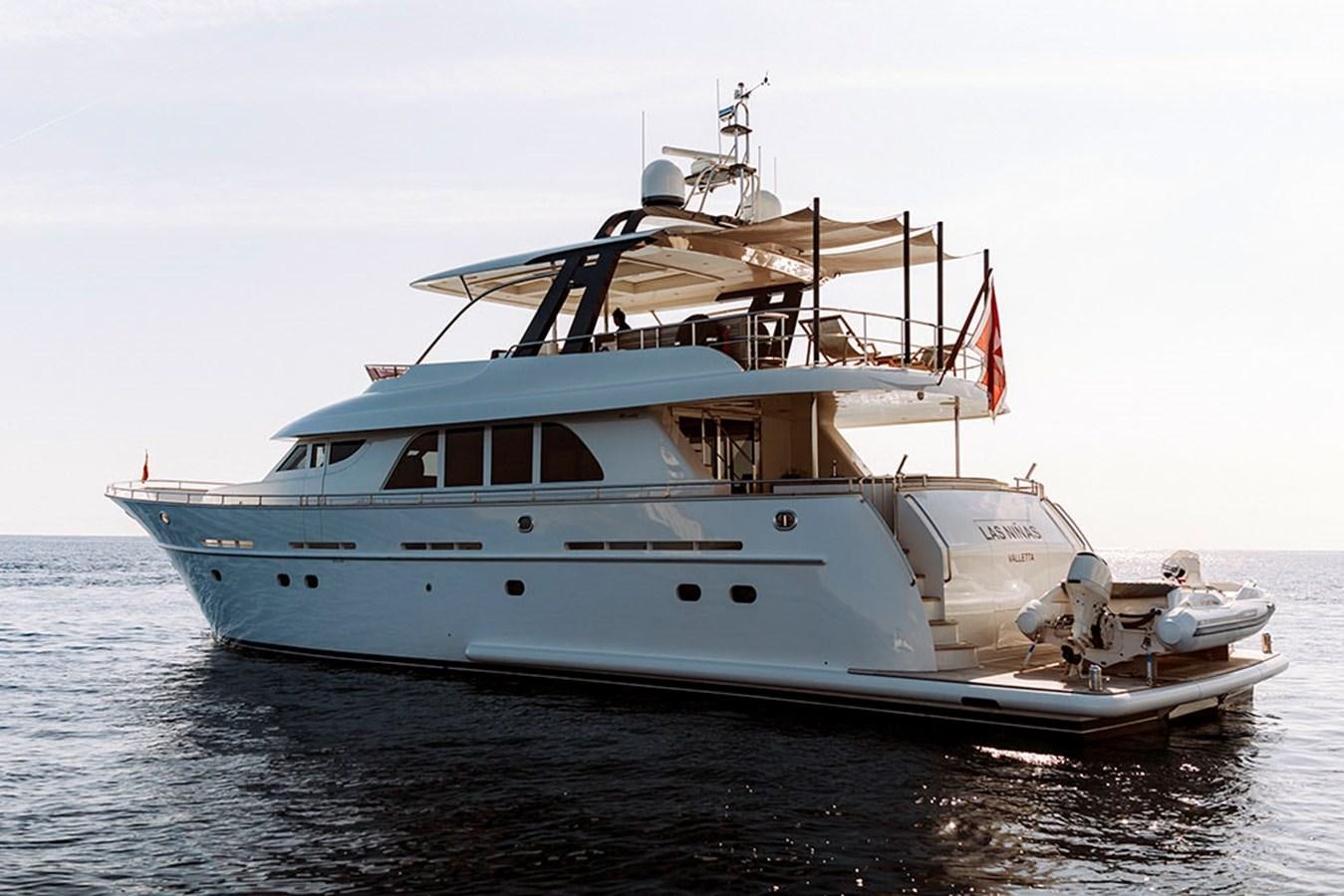 a large white boat in the water aboard LAS NINAS Yacht for Sale