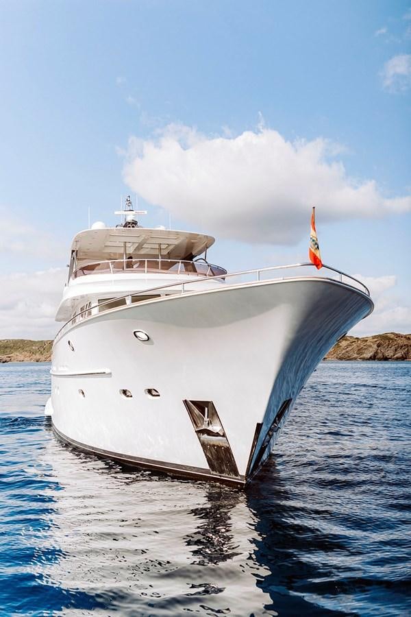 a large white boat in the water aboard LAS NINAS Yacht for Sale