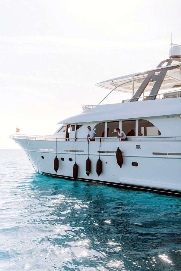 a white boat in the water aboard LAS NINAS Yacht for Sale