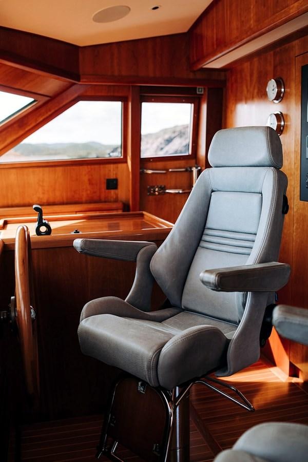 a room with a desk and chairs aboard LAS NINAS Yacht for Sale