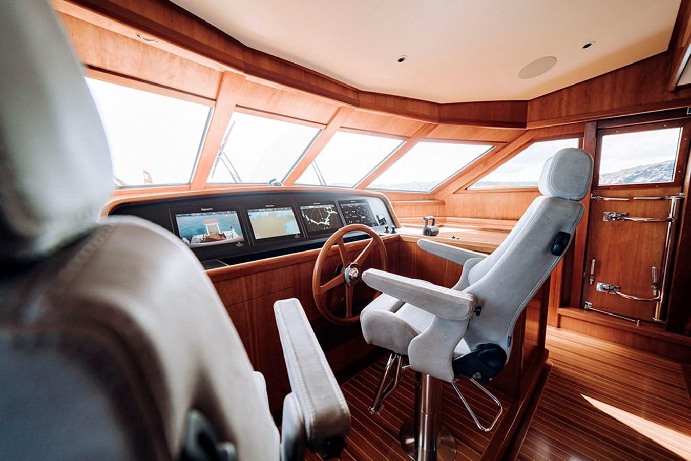 inside of a car aboard LAS NINAS Yacht for Sale