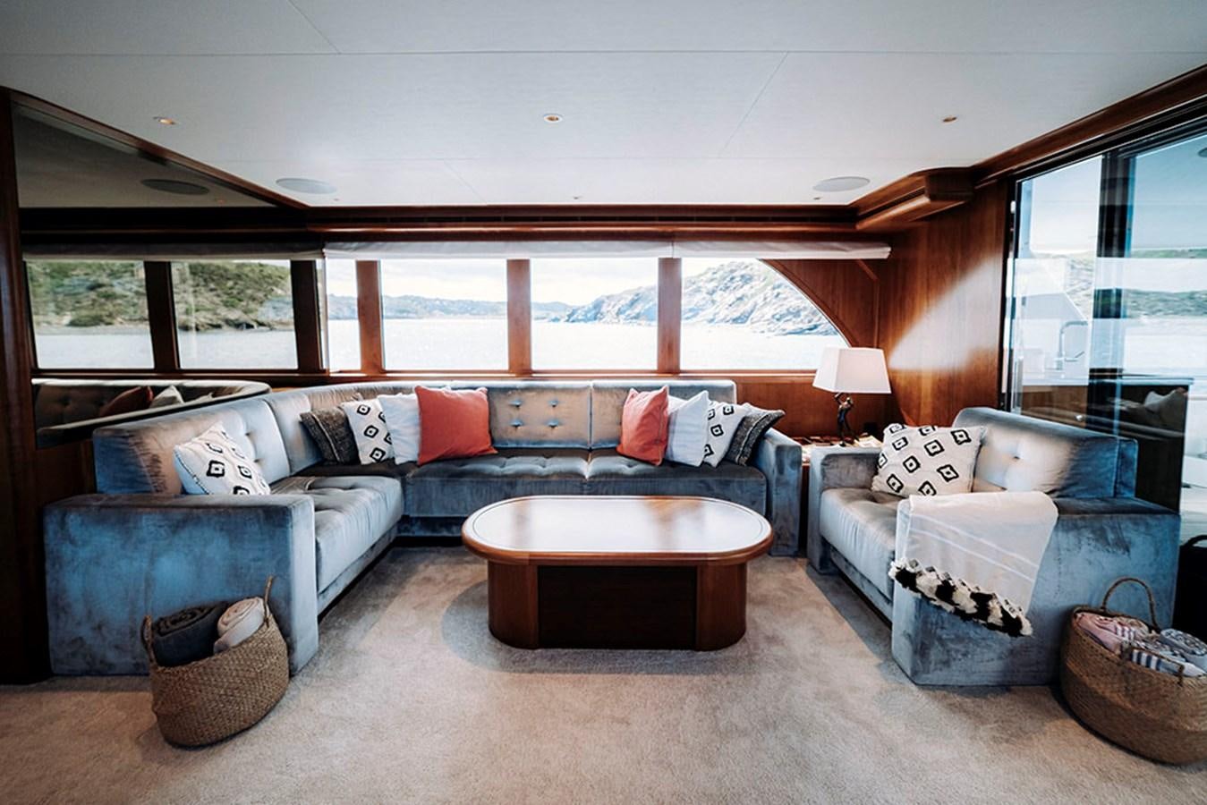 a living room with a large window aboard LAS NINAS Yacht for Sale