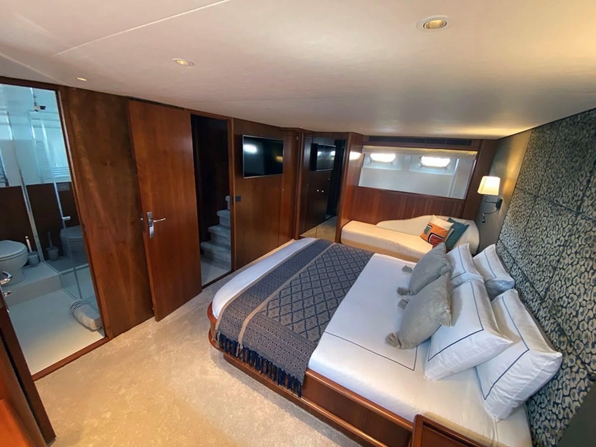 a hotel room with a bed aboard LAS NINAS Yacht for Sale
