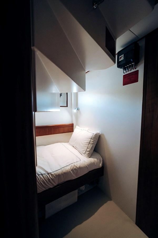 a bed in a room aboard LAS NINAS Yacht for Sale