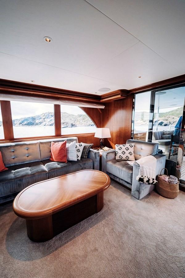 a bedroom with a large bed aboard LAS NINAS Yacht for Sale