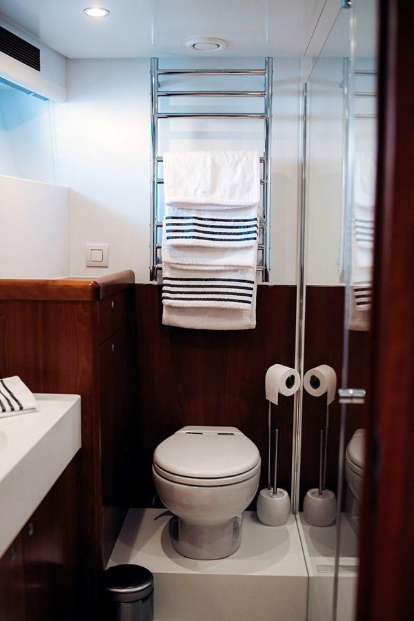 a bathroom with a stand up shower aboard LAS NINAS Yacht for Sale