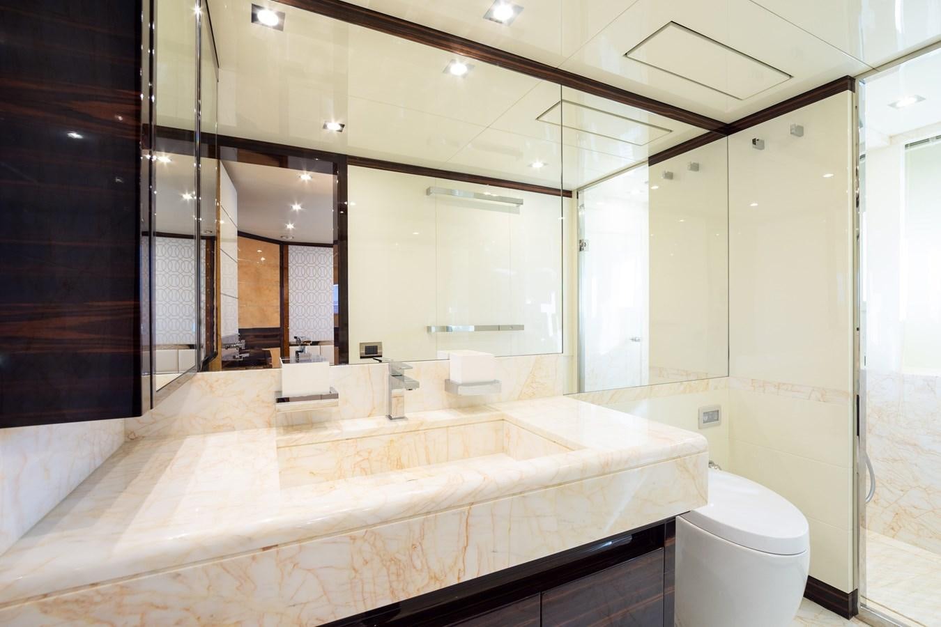 a bathroom with a large mirror aboard VARVARA Yacht for Sale