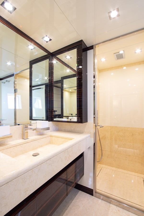 a bathroom with a large mirror aboard VARVARA Yacht for Sale