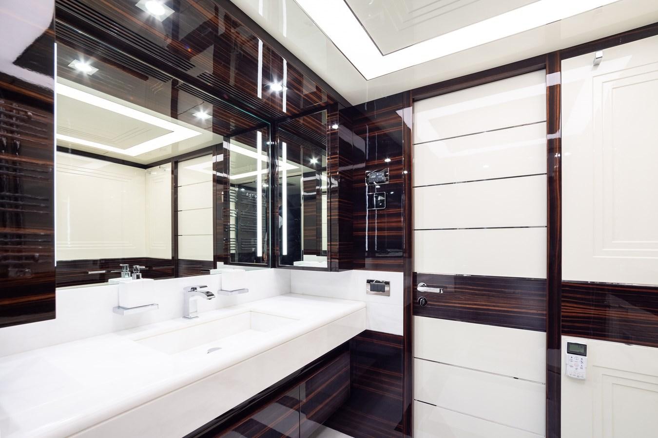 a bathroom with a large mirror aboard VARVARA Yacht for Sale