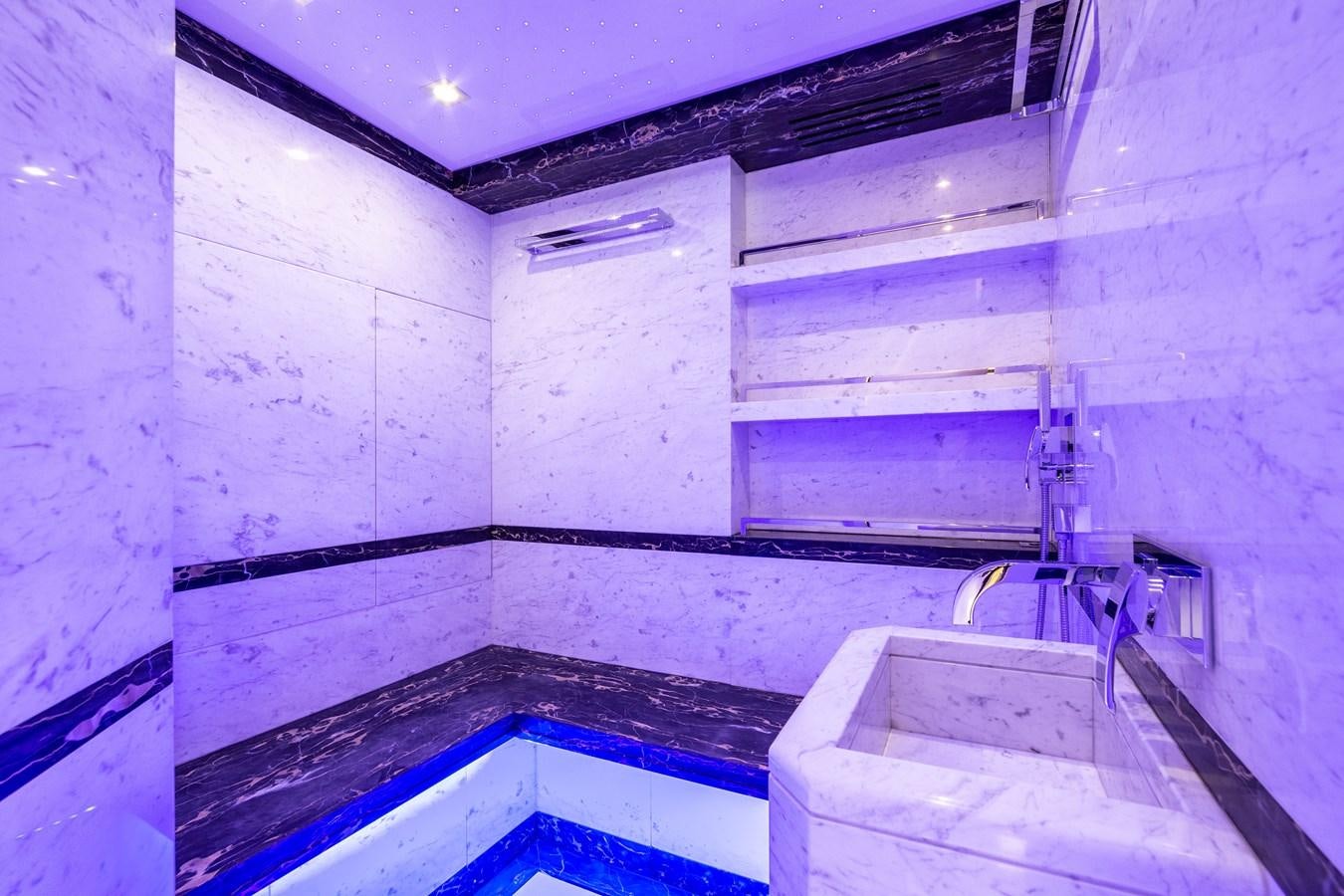 a bathroom with a sink and a bathtub aboard VARVARA Yacht for Sale