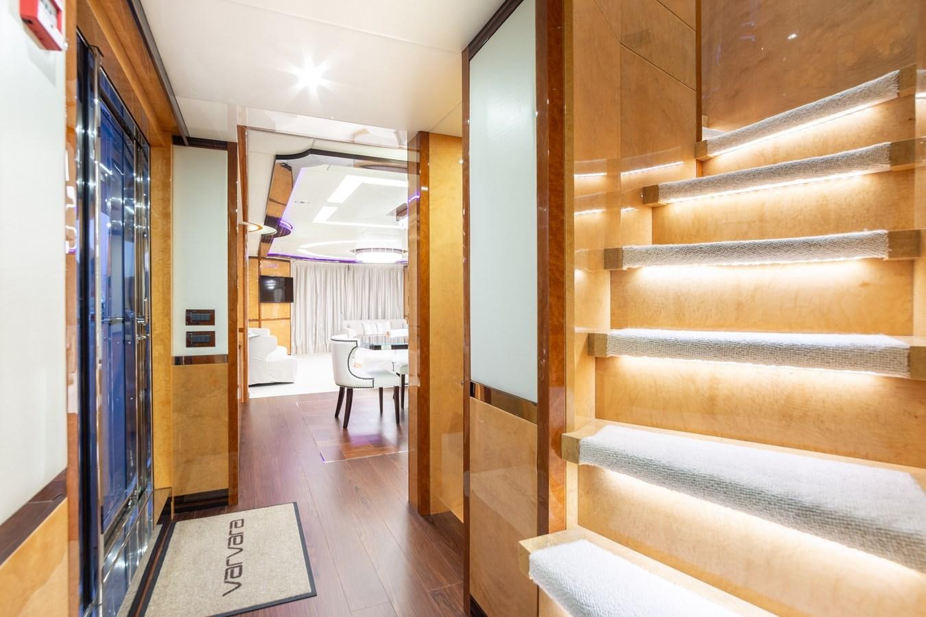 a hallway with wood walls aboard VARVARA Yacht for Sale
