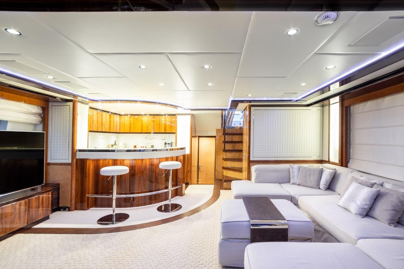 a room with a couch and a table aboard VARVARA Yacht for Sale