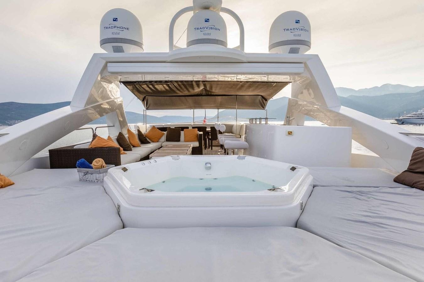 a white bed with a white cover and a white pillow on it aboard BARRACUDA RED SEA Yacht for Sale