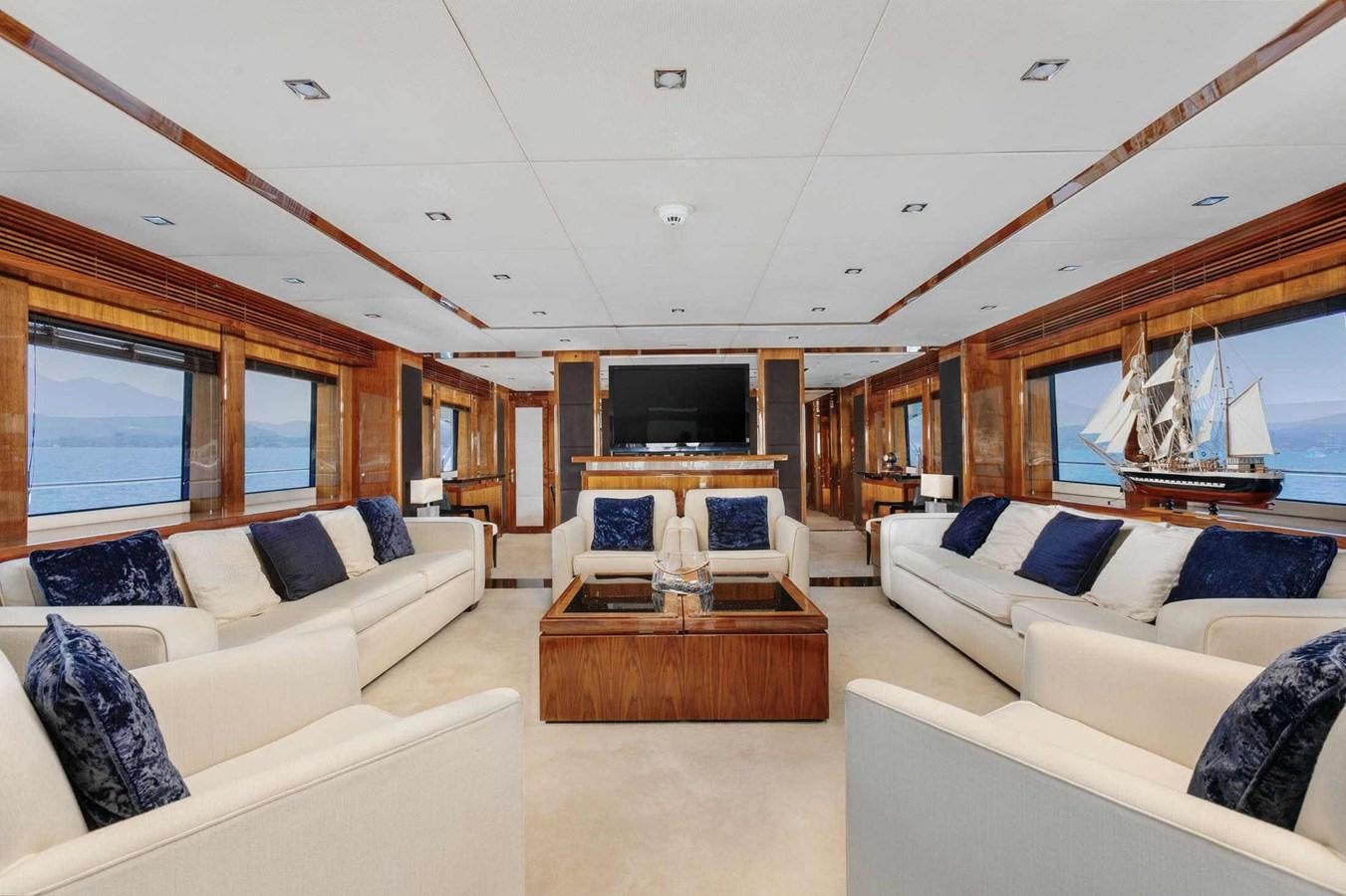 a living room with a large open window aboard BARRACUDA RED SEA Yacht for Sale