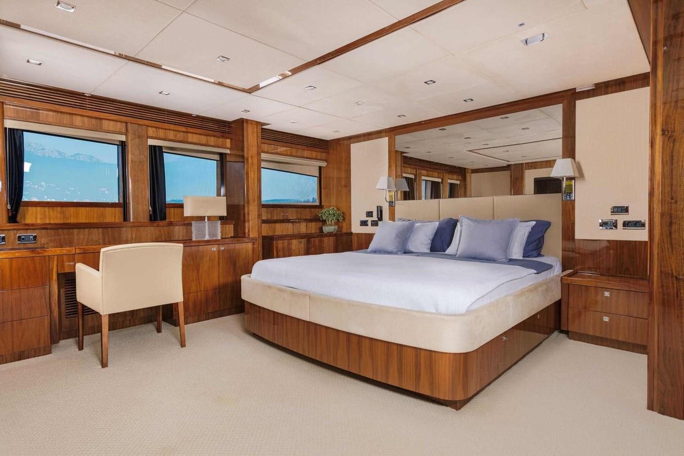 a large bedroom with a large bed aboard BARRACUDA RED SEA Yacht for Sale