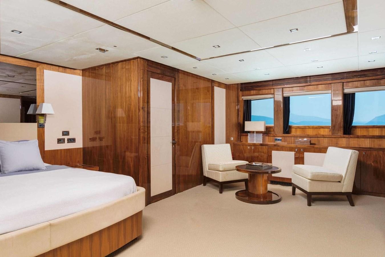 a room with a bed and a desk aboard BARRACUDA RED SEA Yacht for Sale